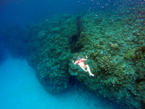 woman in a JOLYN bikini snorkeling