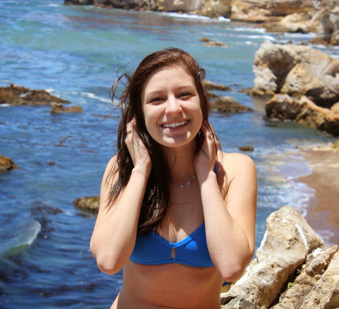 woman in a Jolyn bikini looking a the ocean