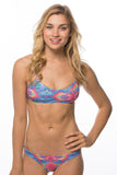 woman wearing a JOLYN print surf bikini