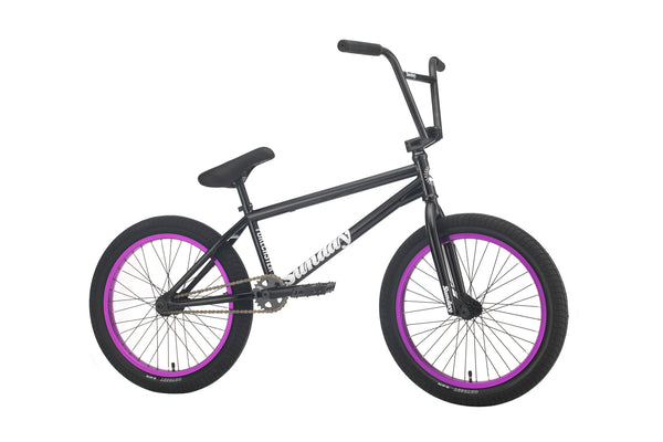 pink and black bmx bike