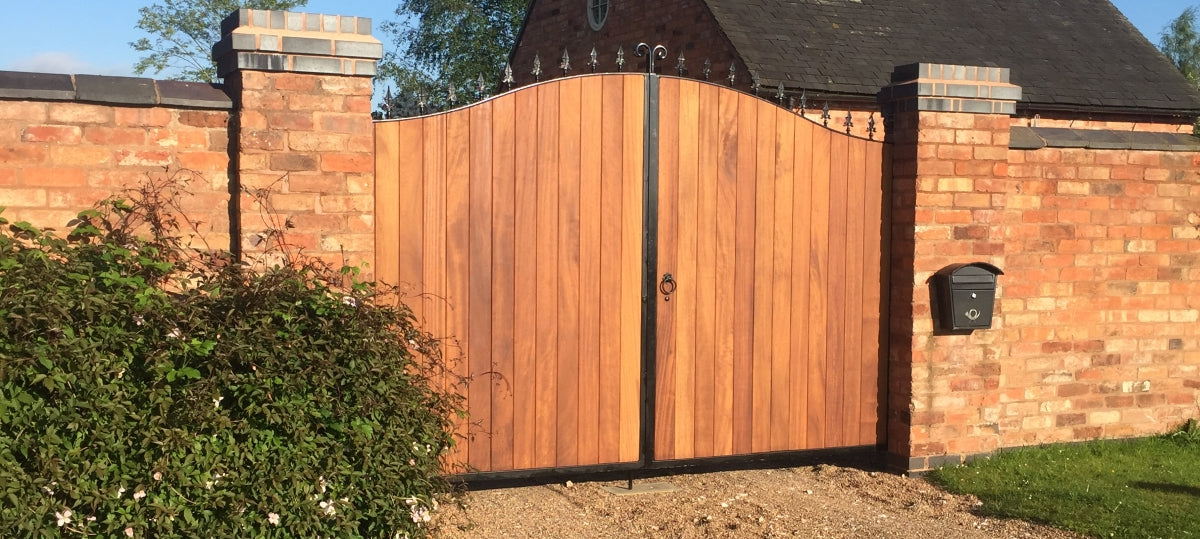 Timber Infill Gates - Metal Framed Gates. Handcrafted by UK's largest bespoke gate manufacturer. Stylish and durable, see our full range of driveway gate designs.