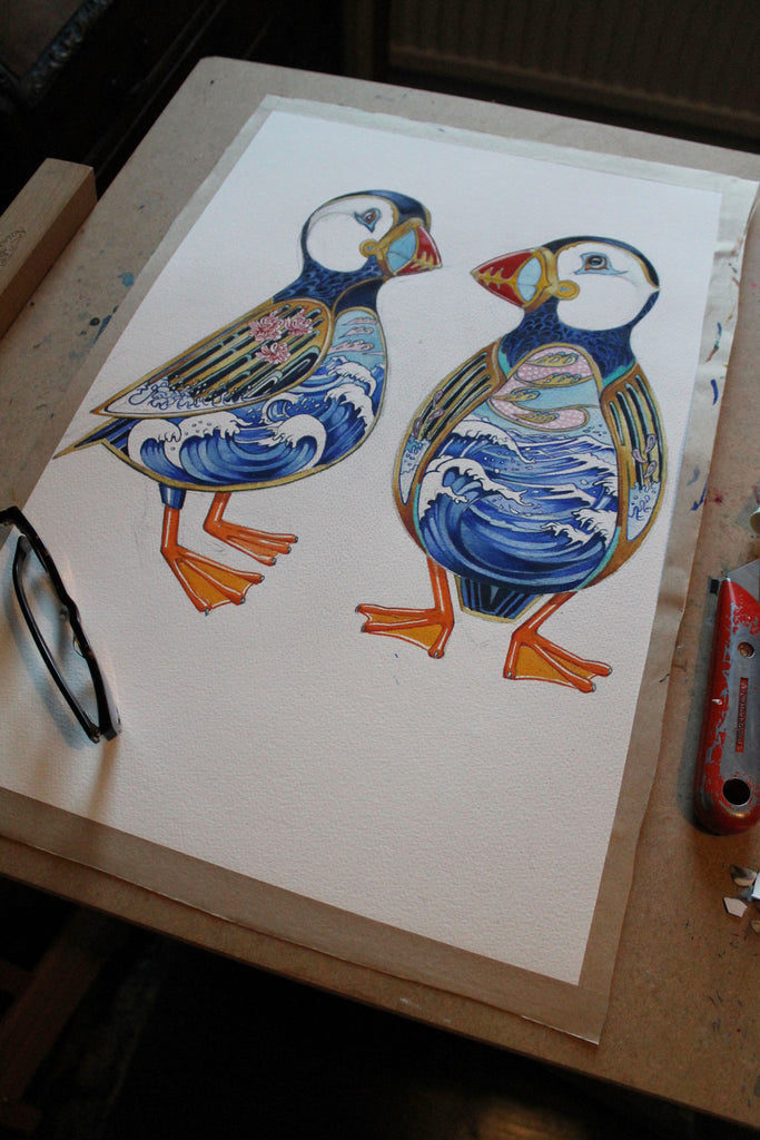 Puffins with seascape interior painting in progress