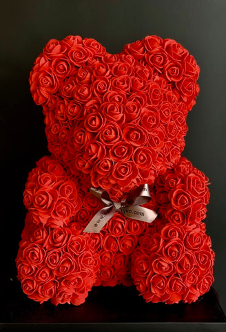 a teddy bear made of roses