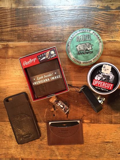 Dapper Gents Men's Gifts Featuring The Original Snake Bite Bottle Opener in Black Leather