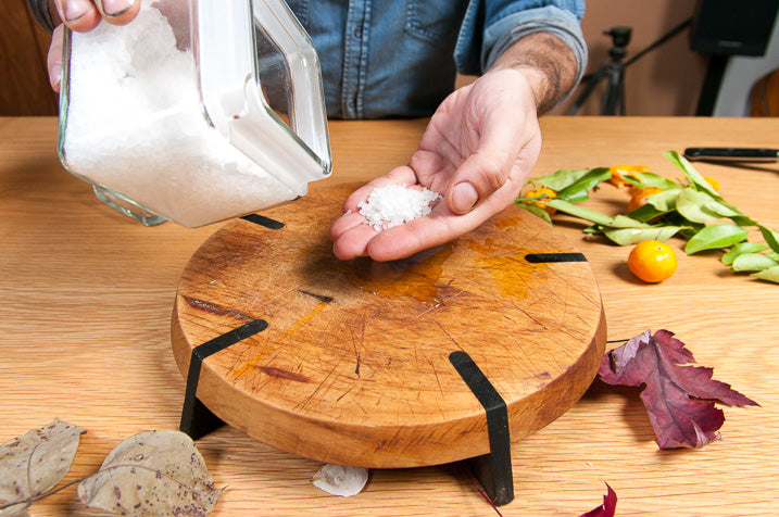 cutting board being cleaned and oiled