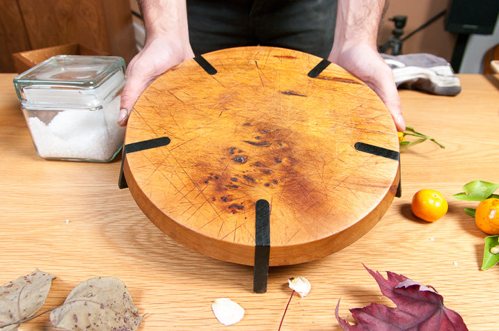 cutting board being cleaned and oiled