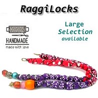 Two slightly different styled red and purple, colourful, handmade patterned Raggi Locks and synthetic dreadlocks, with beaded end shown on white background