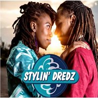Two people with dreadlocks face to face, with Stylin' Dredz logo in lower half of image