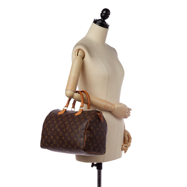 Bolso bandolera Louis Vuitton Vavin BB en cuero monogram huella negro