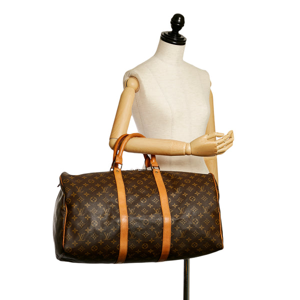 Bolso 24 horas Louis Vuitton en cuero negro, RvceShops Revival