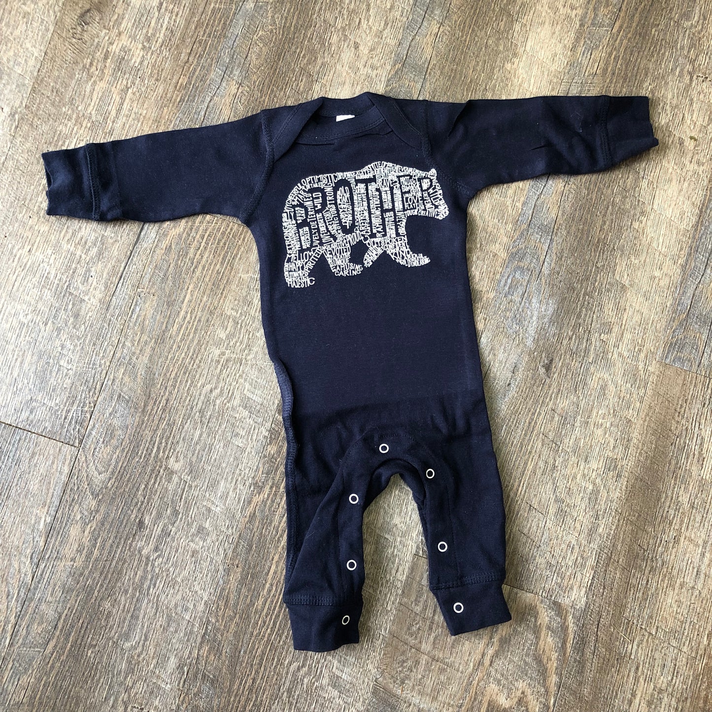 What's In A... KID - long sleeve romper