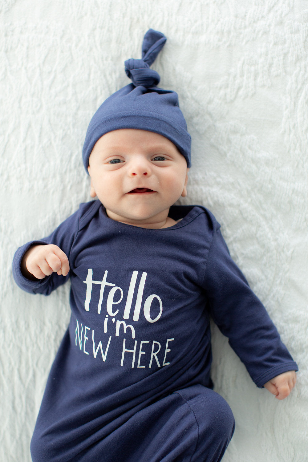 newborn gown and hat