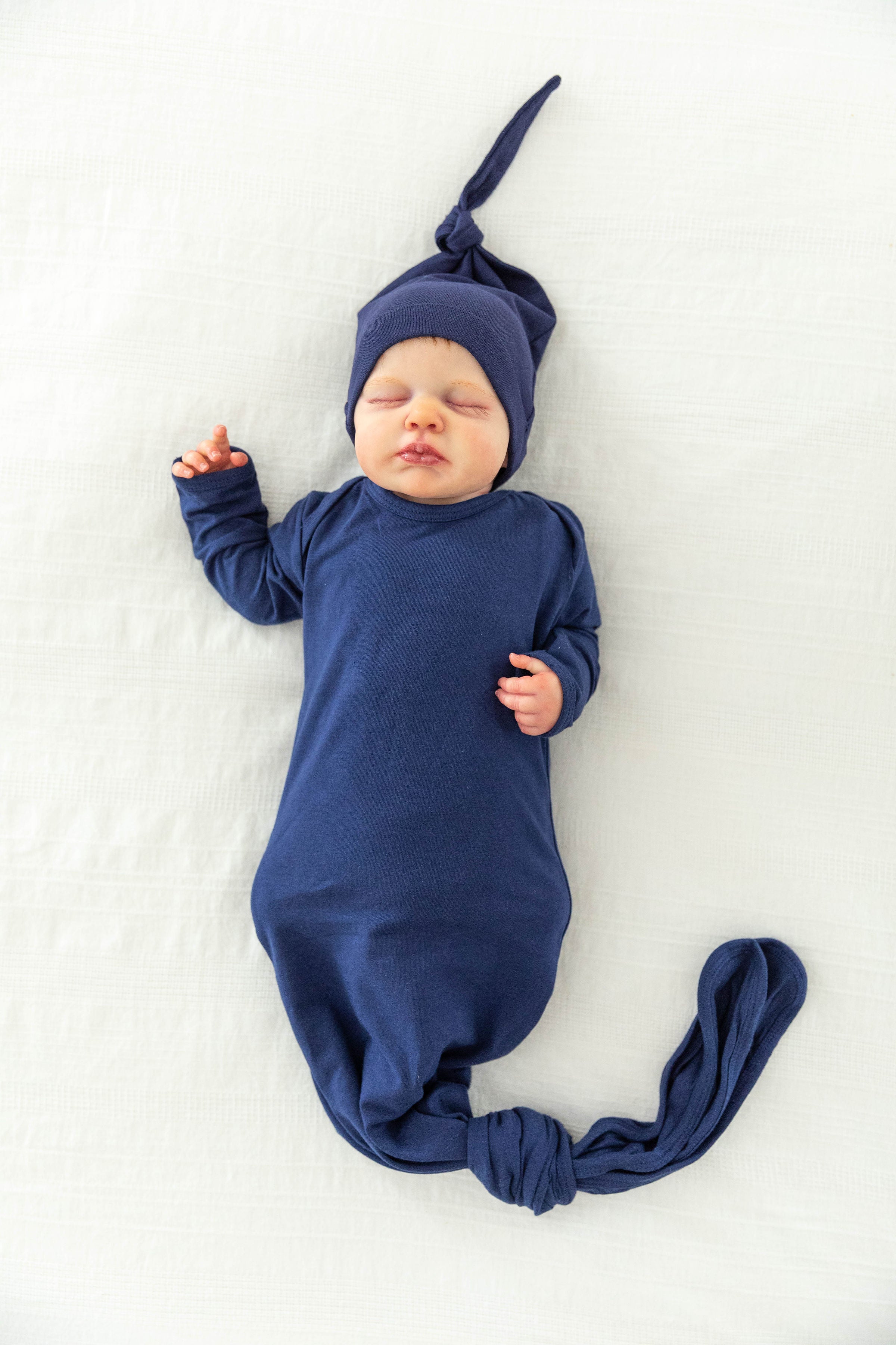 newborn gown and hat