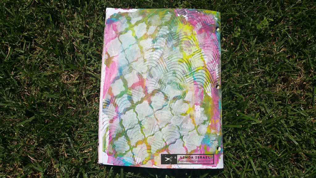 Altered workbook with Paint Stamps Stencils and Glimmer Mists