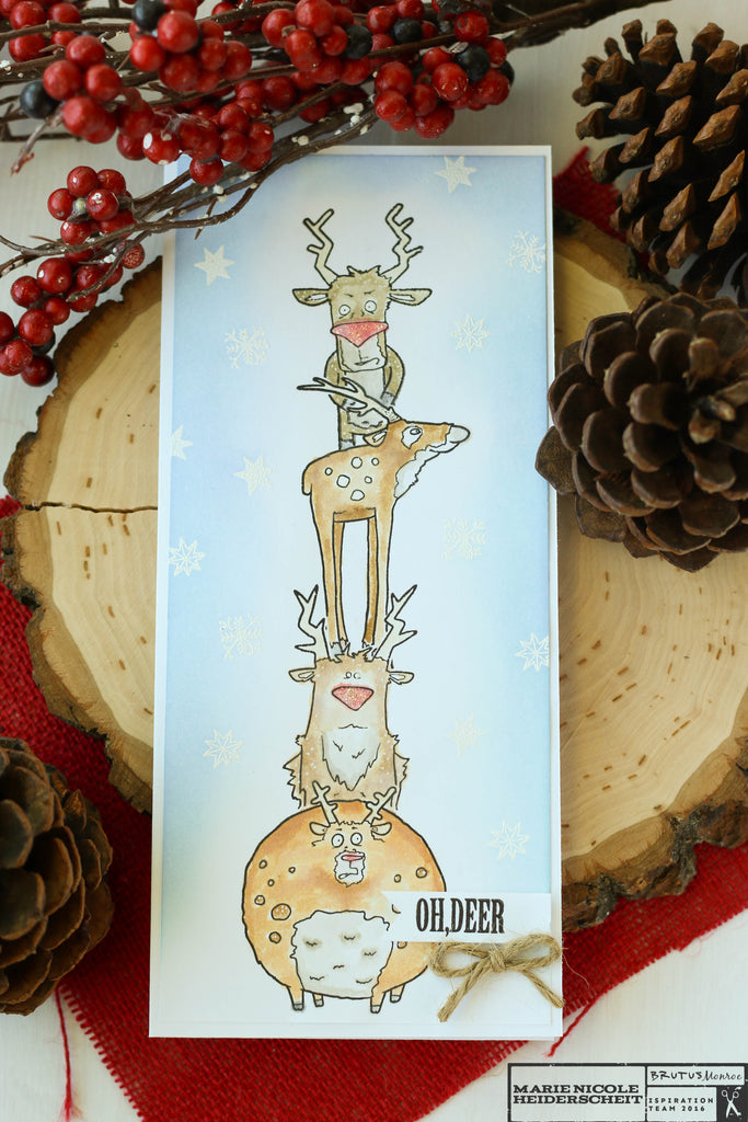 Brutus Monroe's reindeer stamps on this long and skinny card! Lots of masking and coloring went into creating this fun Christmas scene!