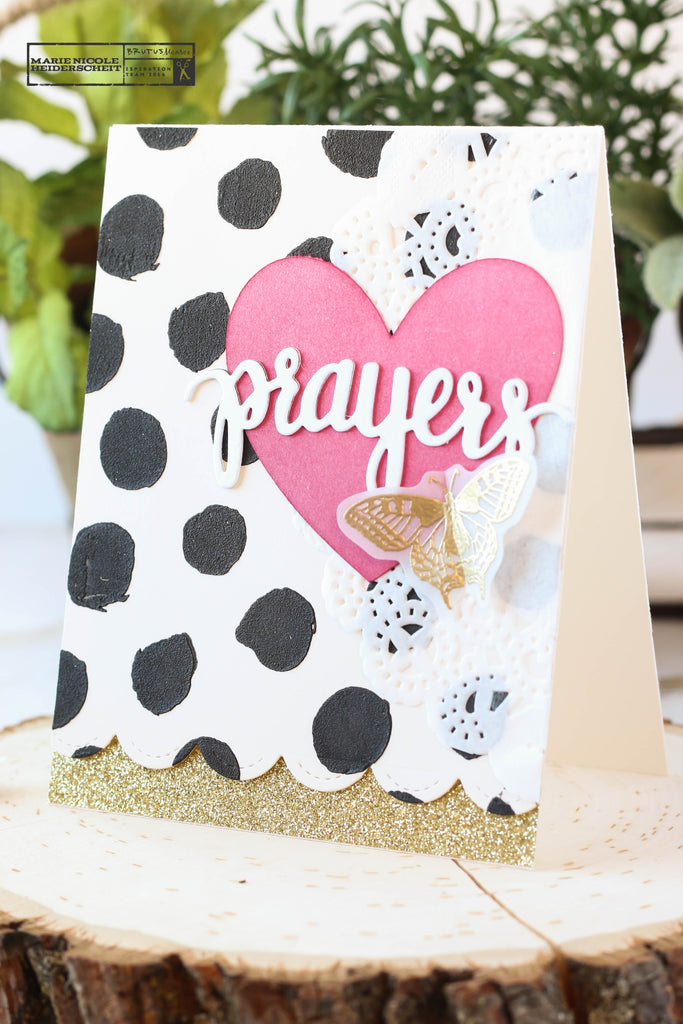 Brutus Monroe polka dot stencil used with black embossing paste to create a cute and stunning background for this card! 