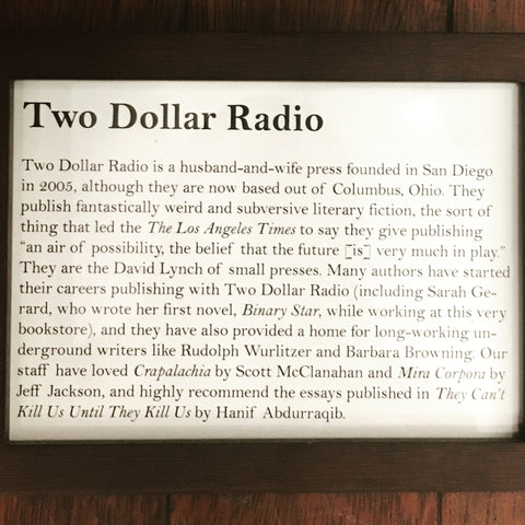 McNally Jackson Booksellers Two Dollar Radio shelf sign
