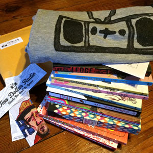 Two Dollar Radio book and shirt stack
