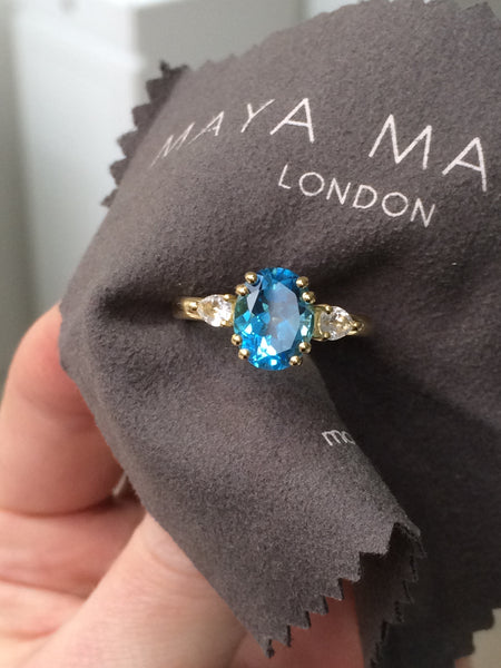 blue Swiss topaz engagement ring