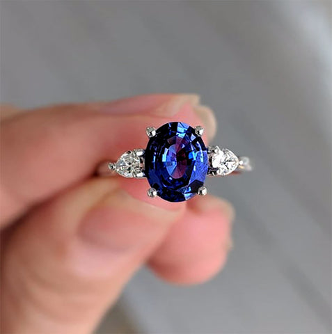 Sapphire engagement ring pear shaped diamonds