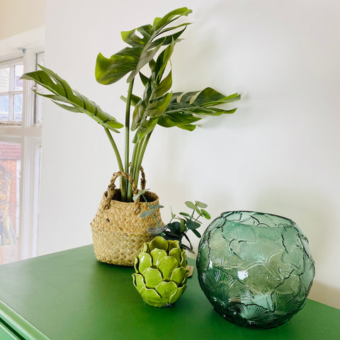 Green accessories with glass vase