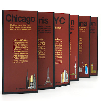 group of foldout city maps with red covers