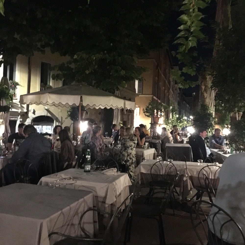 Santa Lucia restaurant in Rome nighttime view of the patio dining area