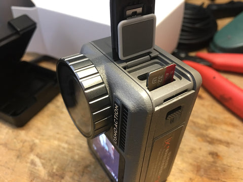 DJI Osmo Action side loading card release