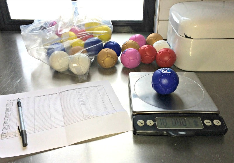 Weighing Swax Lax Lacrosse Training Balls for Quality Control