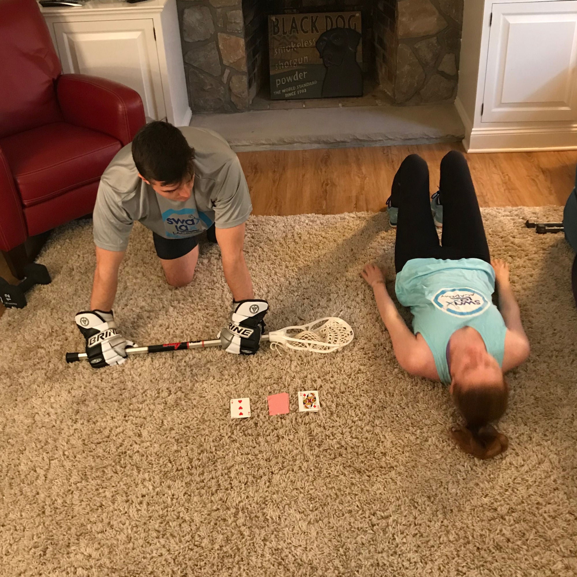 Lacrosse coaches Brian and Liza staying in shape and training using playing cards as prompts