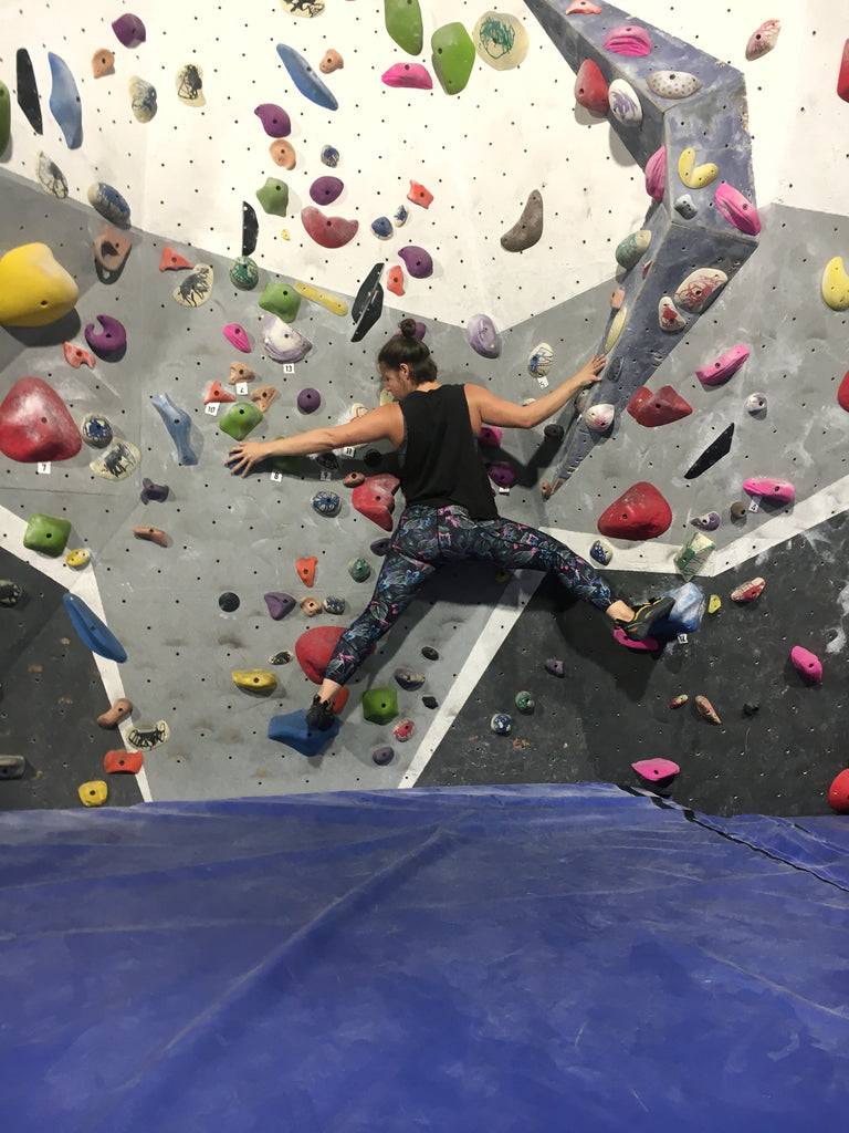 female indoor bouldering