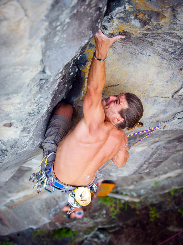 HoldBreaker- man climbing outdoors