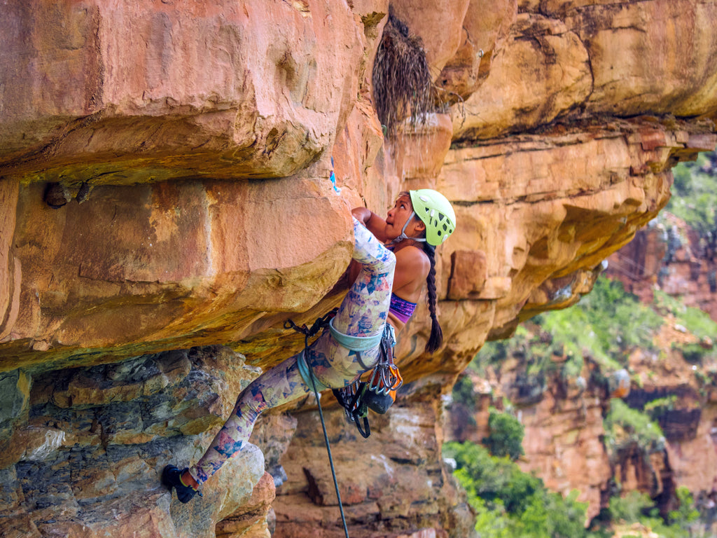 HoldBreaker 3 - female climber climbing outdoors with heel hook