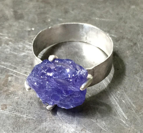 Magical deep violet blue tanzanite ring, rough, prong-set in sterling silver