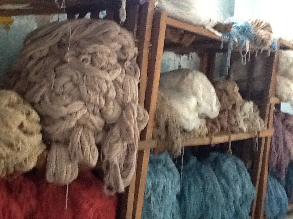 Bundles of spun wool ready to be turned into a beautiful rug - Main Street Oriental Rugs