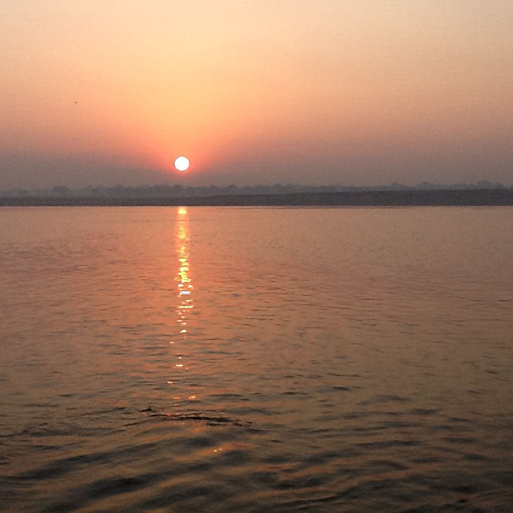 Sunset over the river in Varanasi, India - Main Street Oriental Rugs