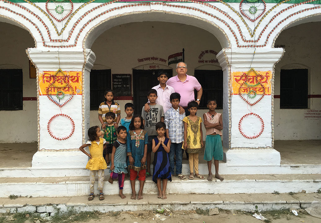 School children and I pose outside of their school - Main Street Oriental Rugs