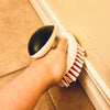 Brush Cleaning Baseboards