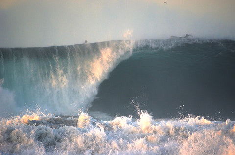 Unknown getting absolutely shacked and then came flying out of a sunrise barrel.