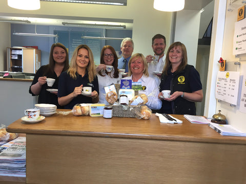 Company Enjoying A Cream Tea Hamper