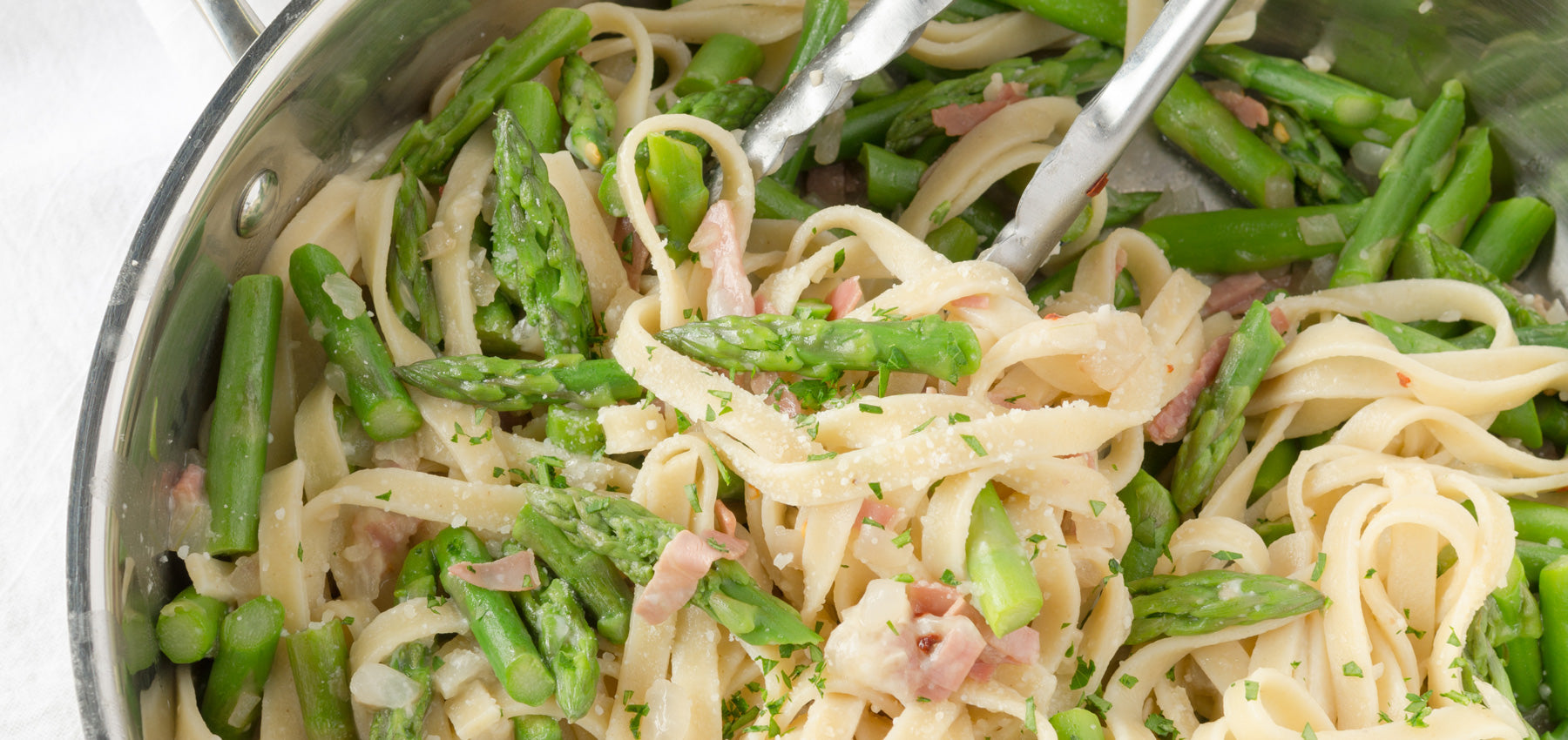 Roasted Garlic Fettuccine with Prosciutto and Asparagus