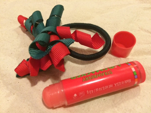 Lip balm and hair elastic