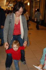 Image of Marjorie walking with her young son