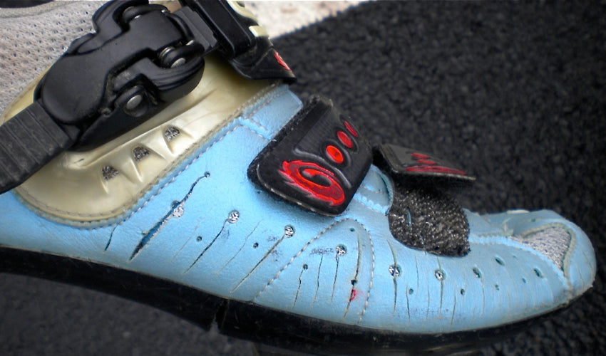Side view of a road cycling shoe that has been modified using cycling shoe surgery techniques