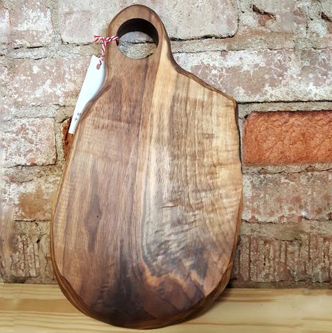 A serving tray showing the contrast between walnut's dark heartwood and light sapwood.