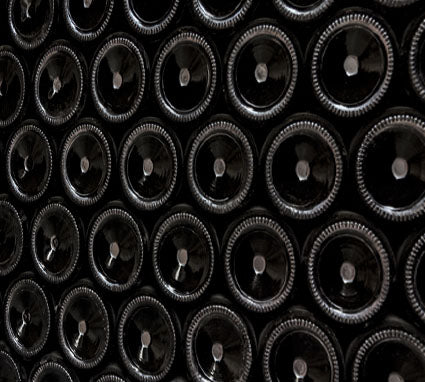 Woodchurch Wine Bottles stacked