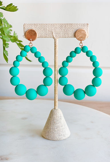 Choosing Joy Earrings in Turquoise, teardrop shaped earrings with turquoise balls