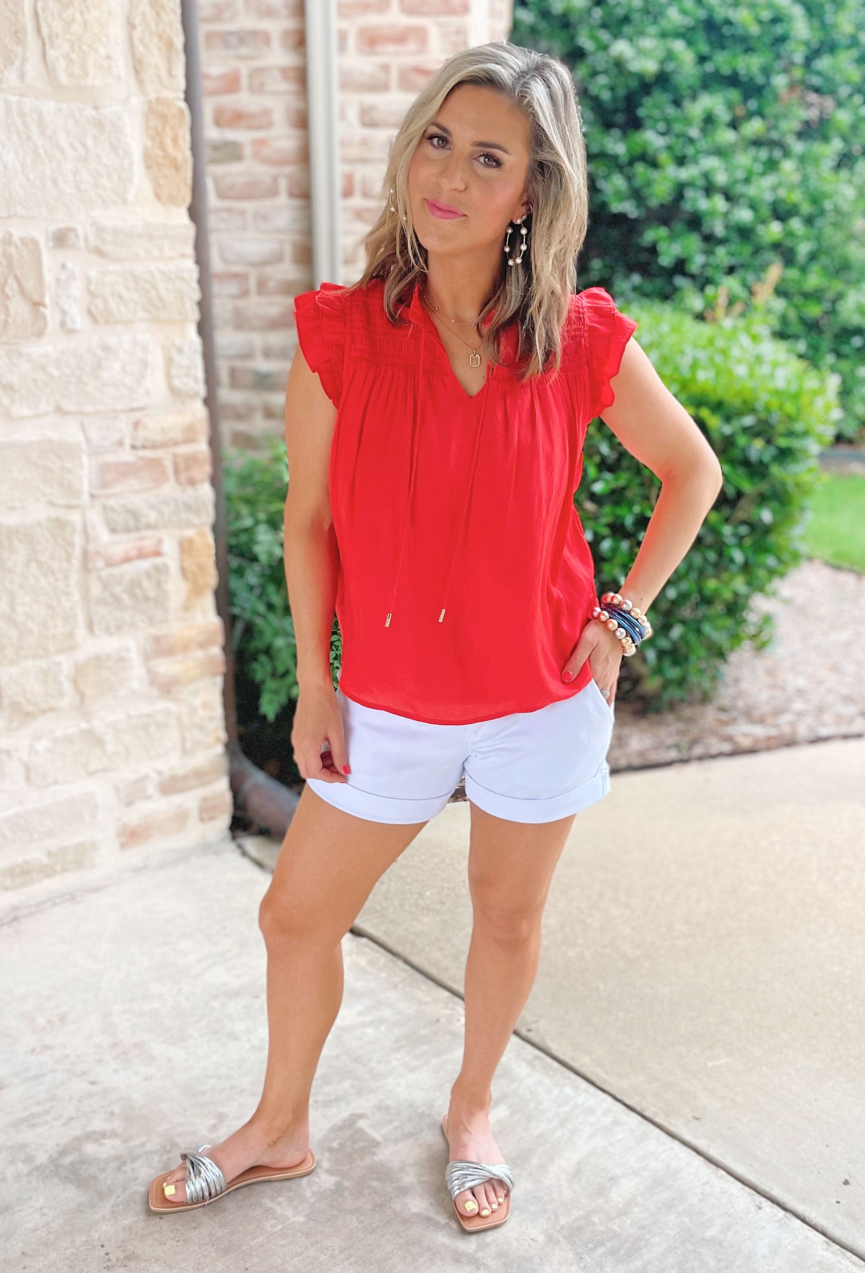 Just A Feeling Blouse, Red blouse that features ruffle sleeves, v-neck line, and smocked detail along the top