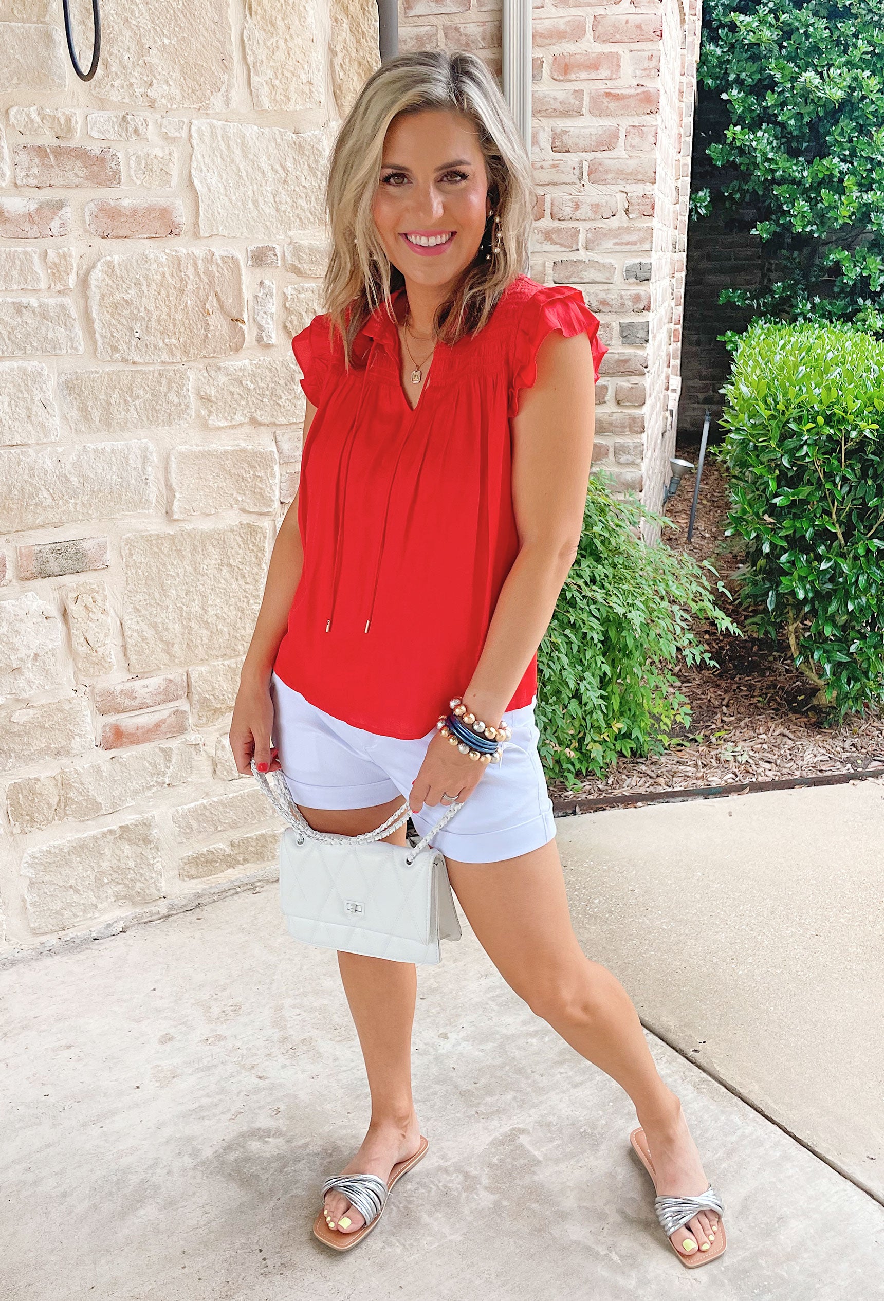 Just A Feeling Blouse, Red blouse that features ruffle sleeves, v-neck line, and smocked detail along the top