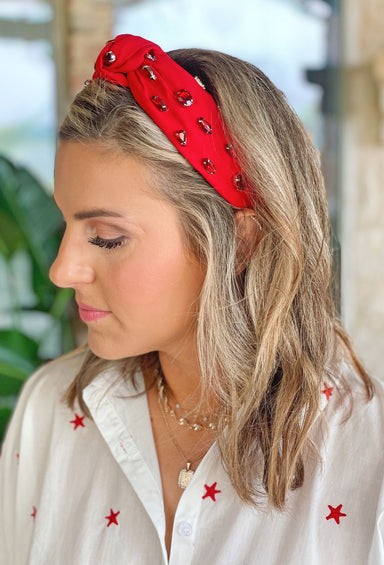 Macey Rhinestone Headband in Red, Headband that features a red knot design and sparkling pink rhinestones